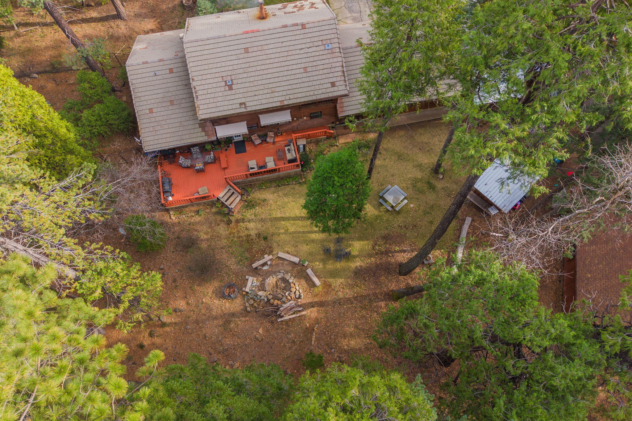 7758 Hidden Meadows Road Shingletown, CA 96088 - Photo 41 of 63 an aerial view of a house with a yard and lake view