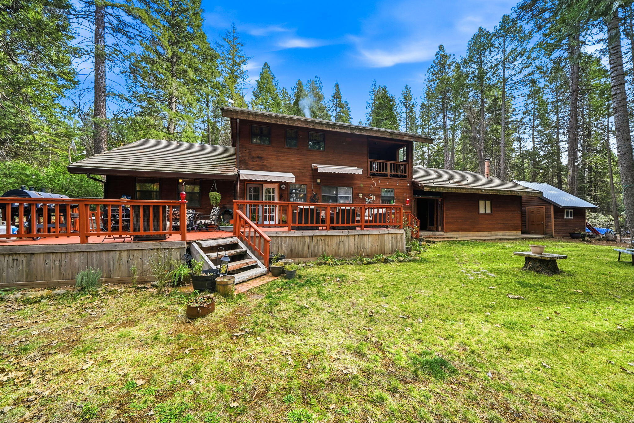 7758 Hidden Meadows Road Shingletown, CA 96088 - Photo 6 of 63 a view of a house with a yard