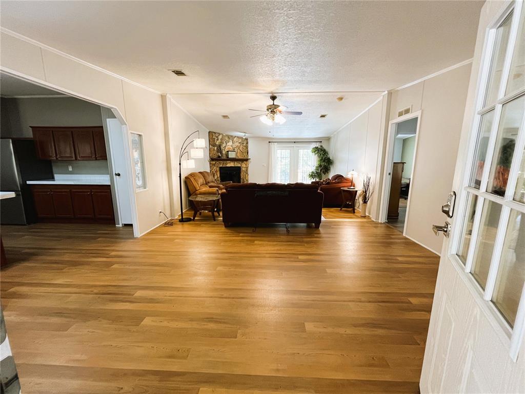7750 156th Terrace Live Oak, FL 32060 - Photo 11 of 41 a view of living room with furniture and windows