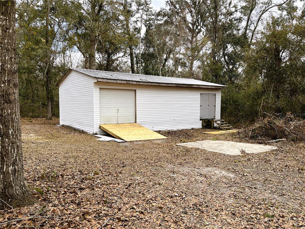 7750 156th Terrace Live Oak, FL 32060 - Photo 30 of 41 a view of a backyard of a house