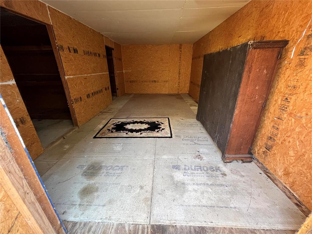 7750 156th Terrace Live Oak, FL 32060 - Photo 31 of 41 a view of entry way with wooden door