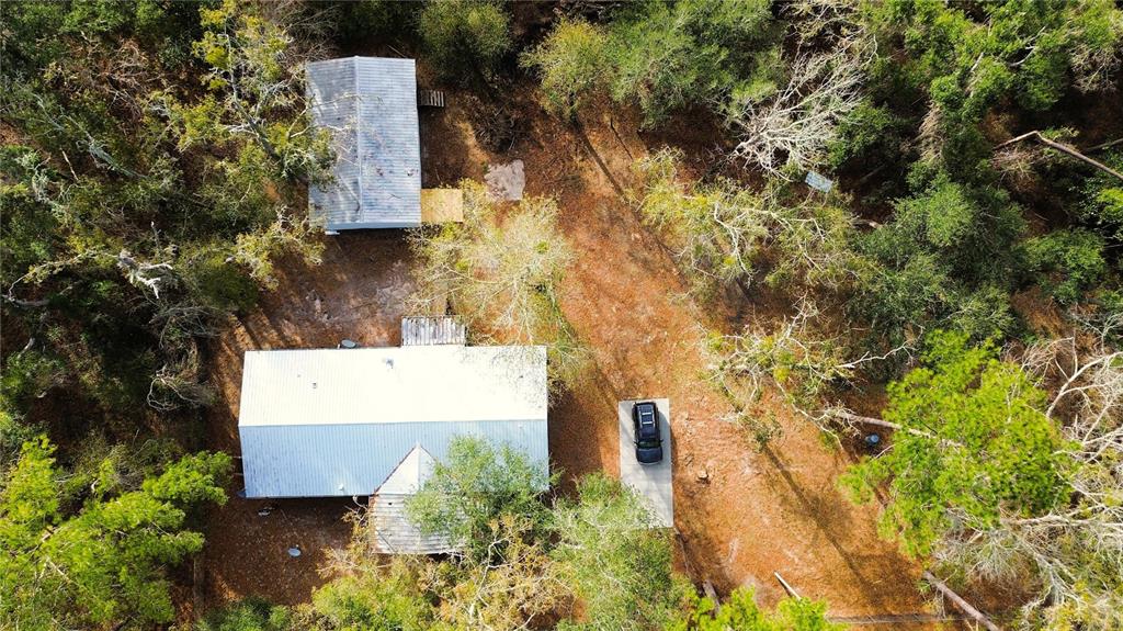 7750 156th Terrace Live Oak, FL 32060 - Photo 37 of 41 an aerial view of residential house with outdoor space and trees all around