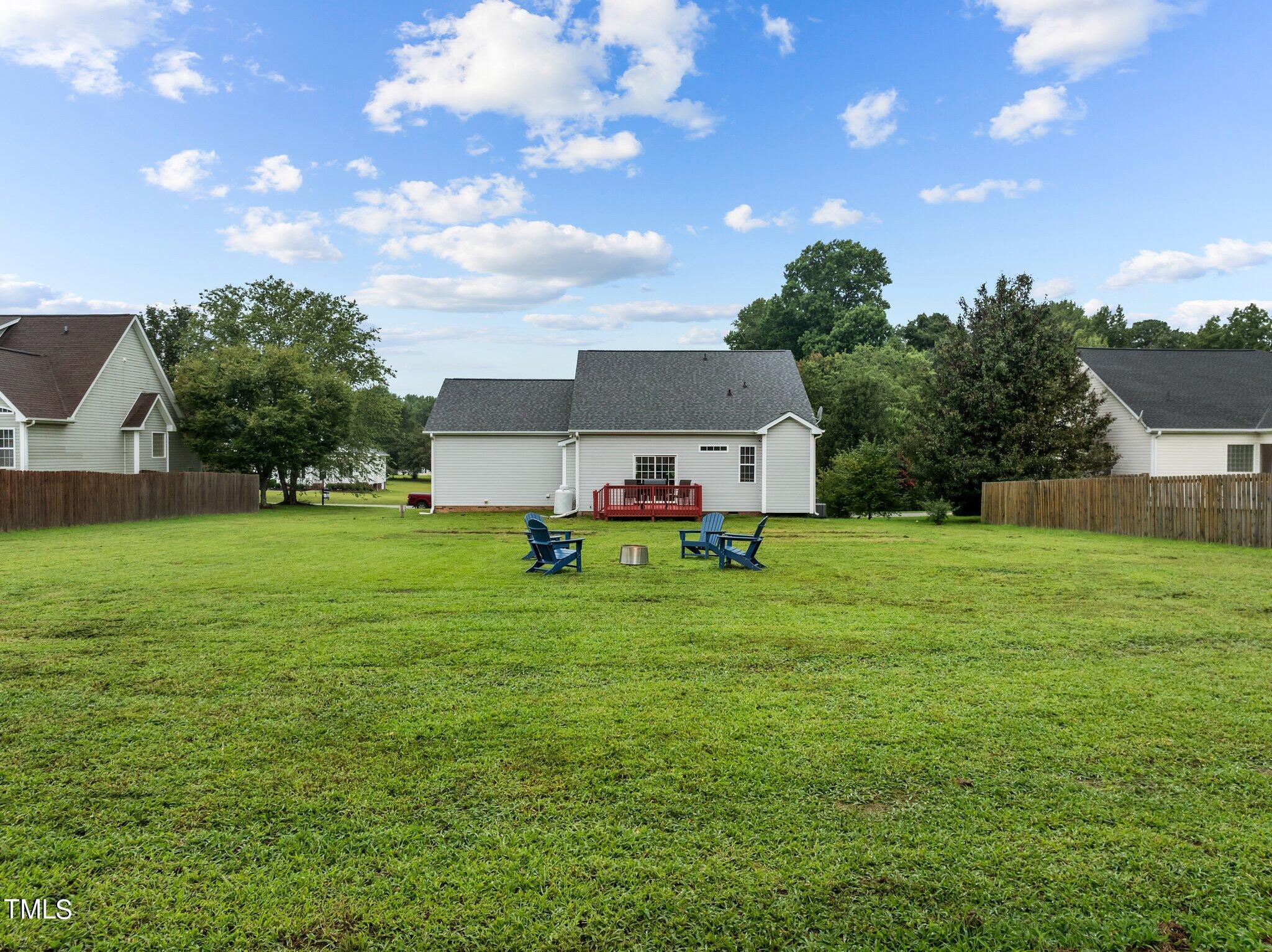 8809 Oregon Inlet Court Raleigh, NC 27603 - Photo 48 of 53 a house view with a garden space