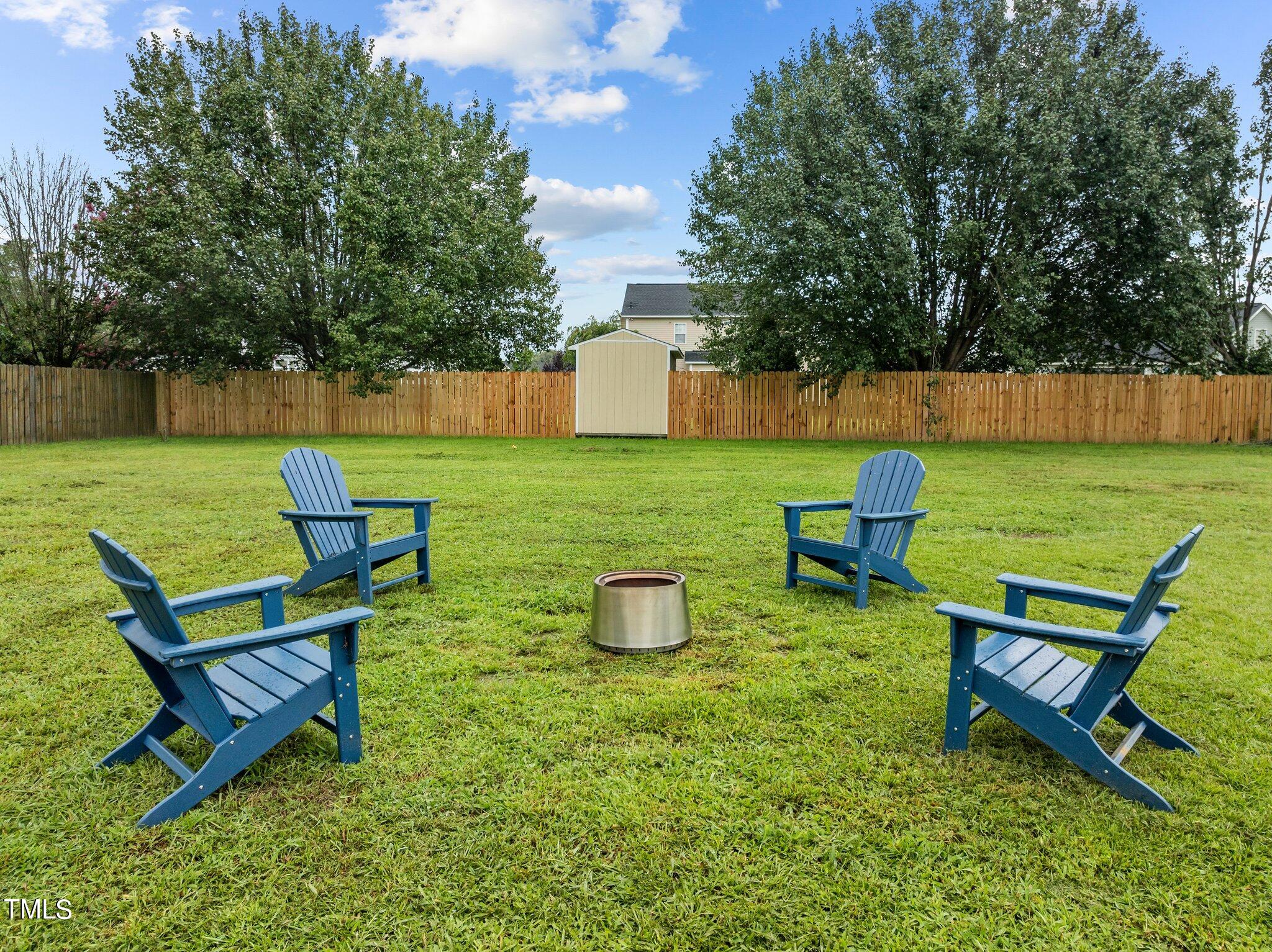 8809 Oregon Inlet Court Raleigh, NC 27603 - Photo 53 of 53 an outdoor sitting area with golf course