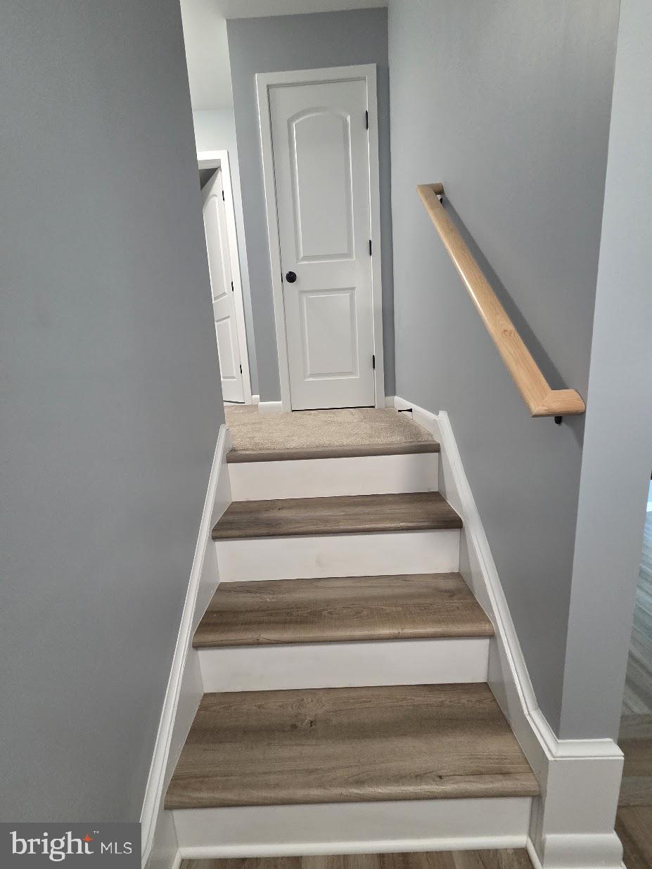 2515 Baltimore Road, Unit 2 Rockville, MD 20853 - Photo 11 of 23 Inviting staircase to serene spaces.