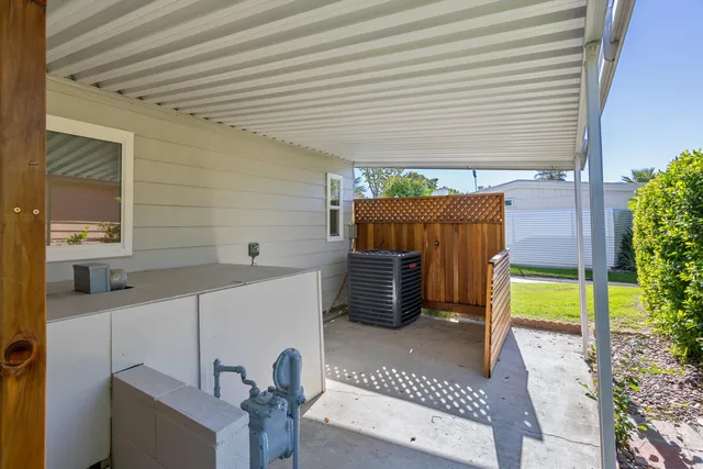 a view of a porch with furniture