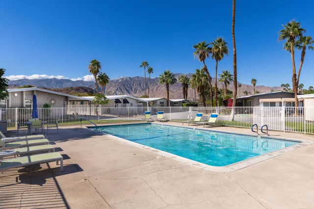 a view of a house with swimming pool