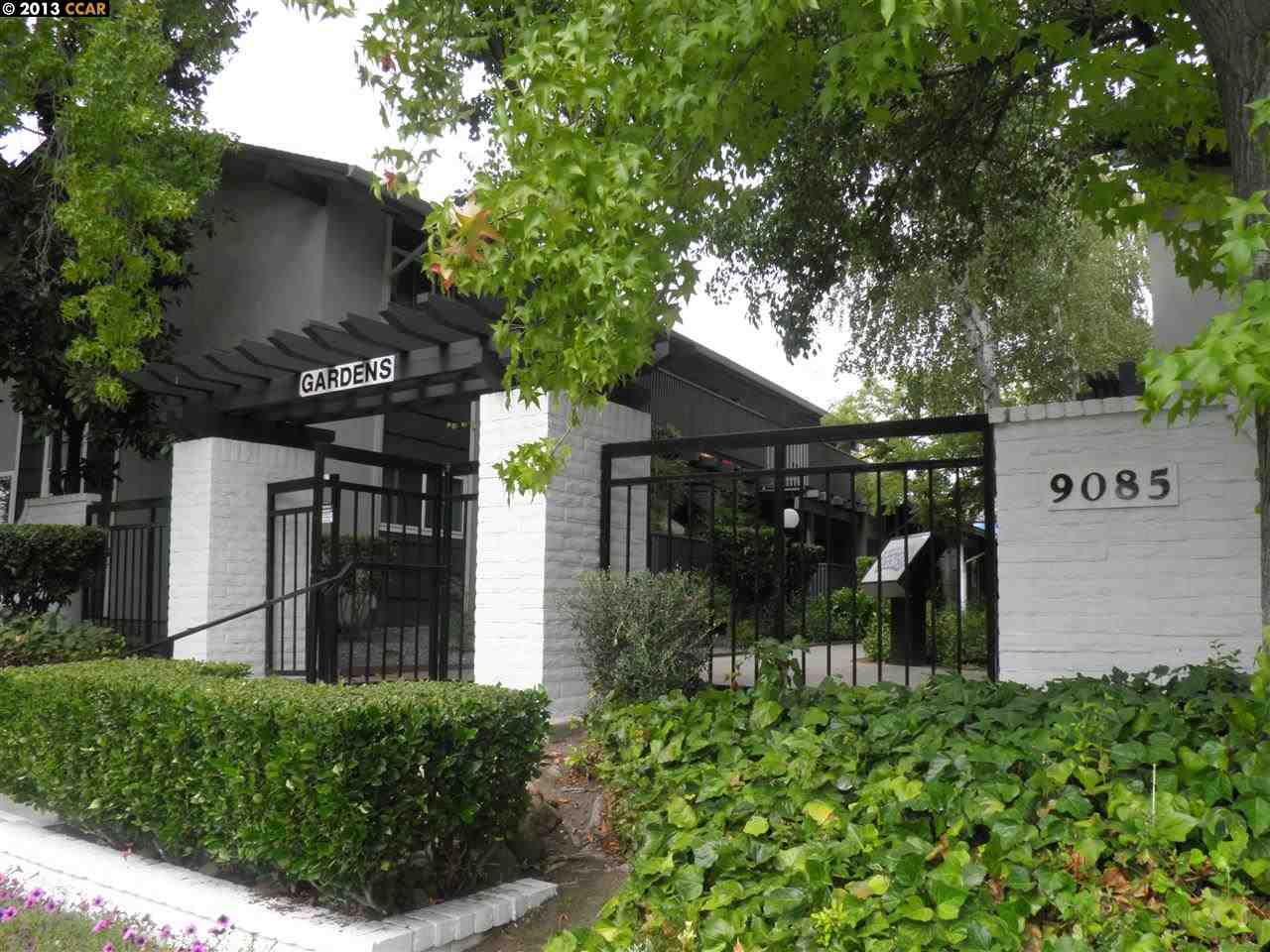 9085 Alcosta Boulevard, Unit 412 San Ramon, CA 94583 - Photo 1 of 1 a front view of a house with a tree