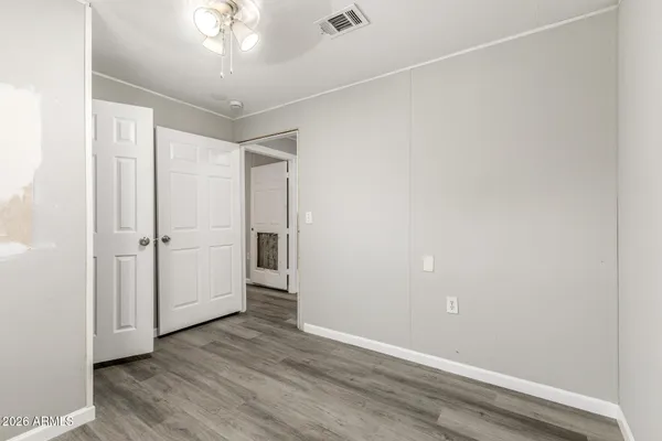 a bathroom with a toilet a sink and shower