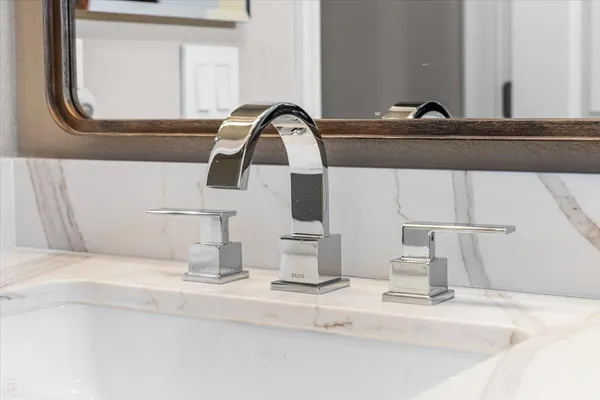 a building outdoor space with patio furniture and garden