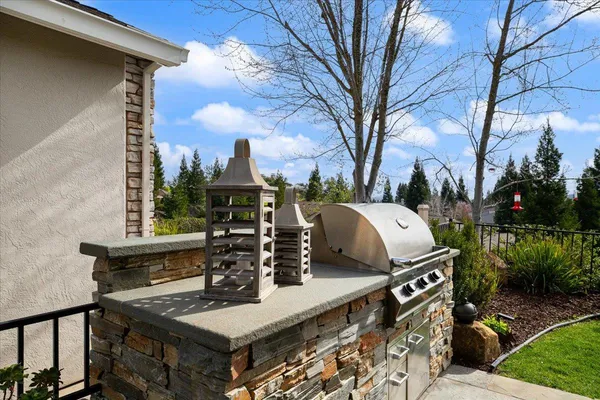 a view of a swimming pool with a yard