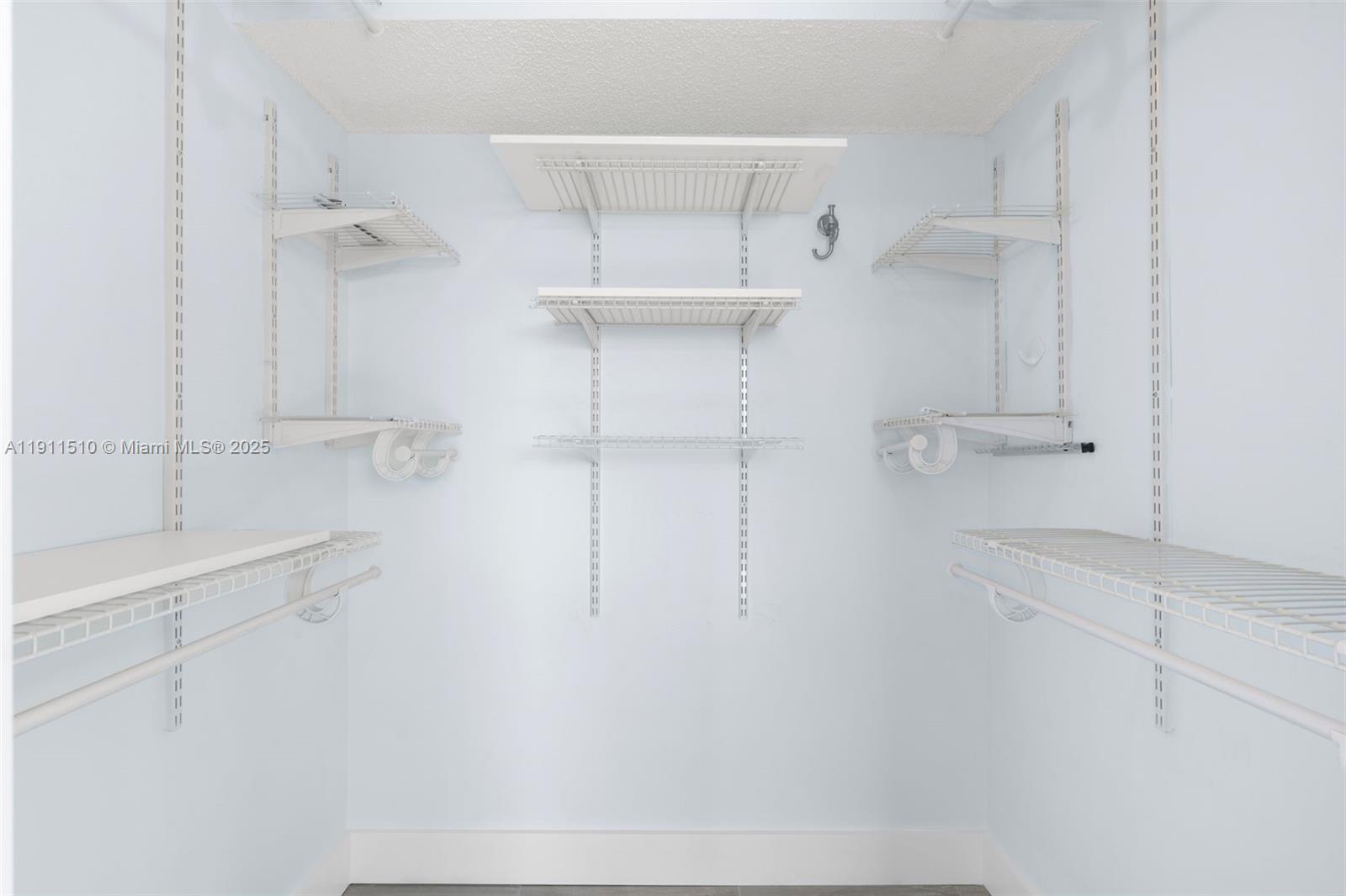 7640 Northwest 18th Street, Unit 301 Margate, FL 33063 - Photo 17 of 35 a view of walk in closet