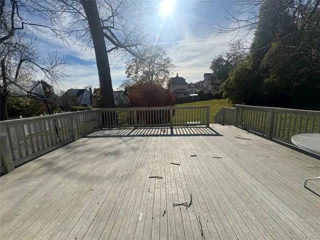 a view of deck with wooden floor and outdoor seating