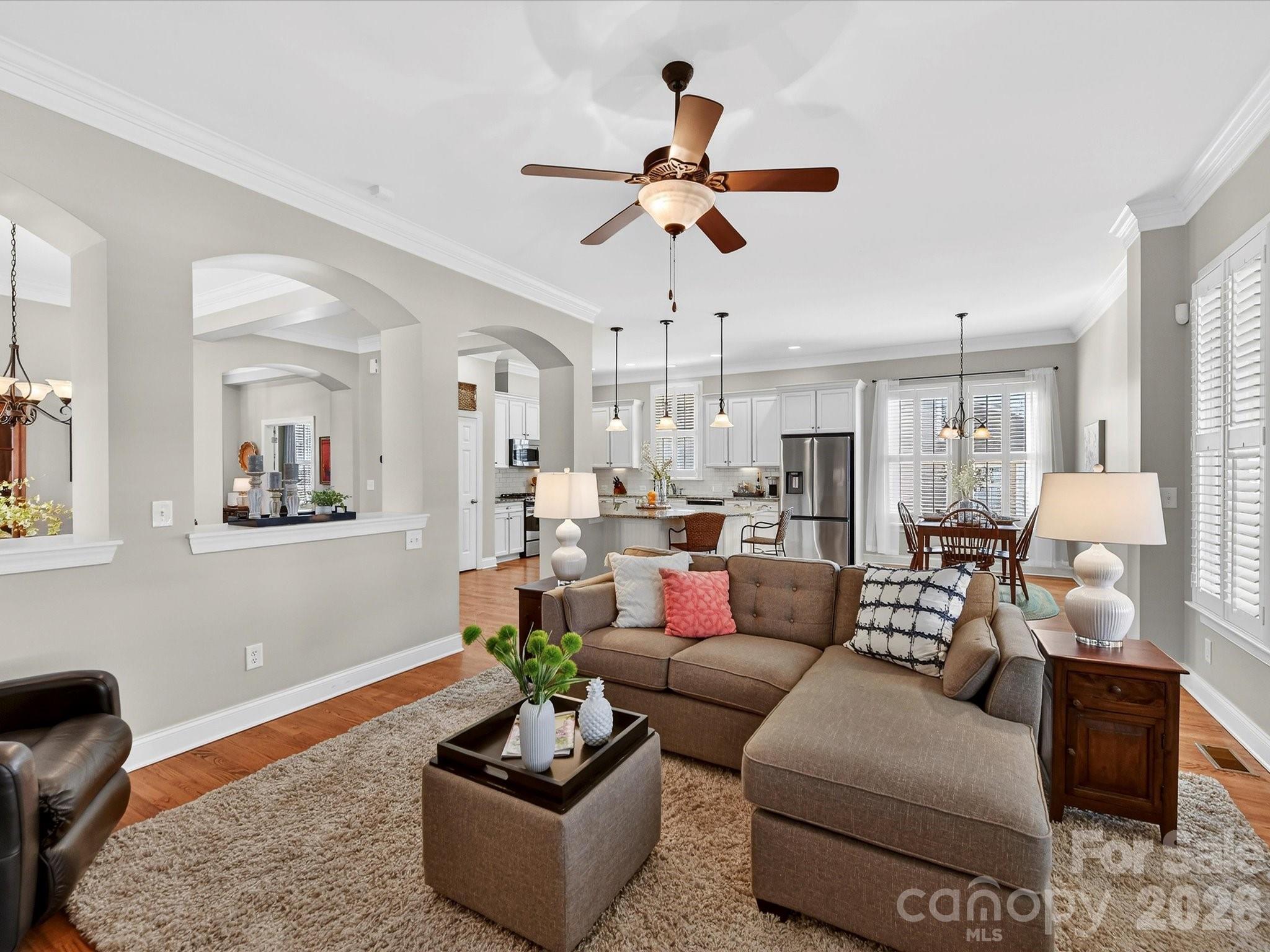 4265 Birkshire Heights Fort Mill, SC 29708 - Photo 13 of 47 a living room with furniture kitchen view and a window