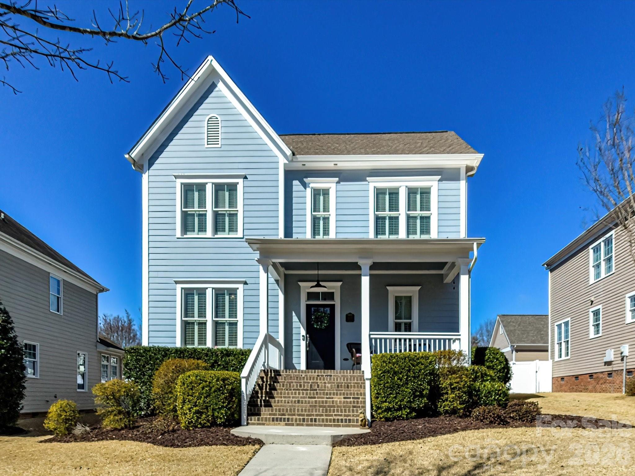 4265 Birkshire Heights Fort Mill, SC 29708 - Photo 2 of 47 a front view of a house with a yard