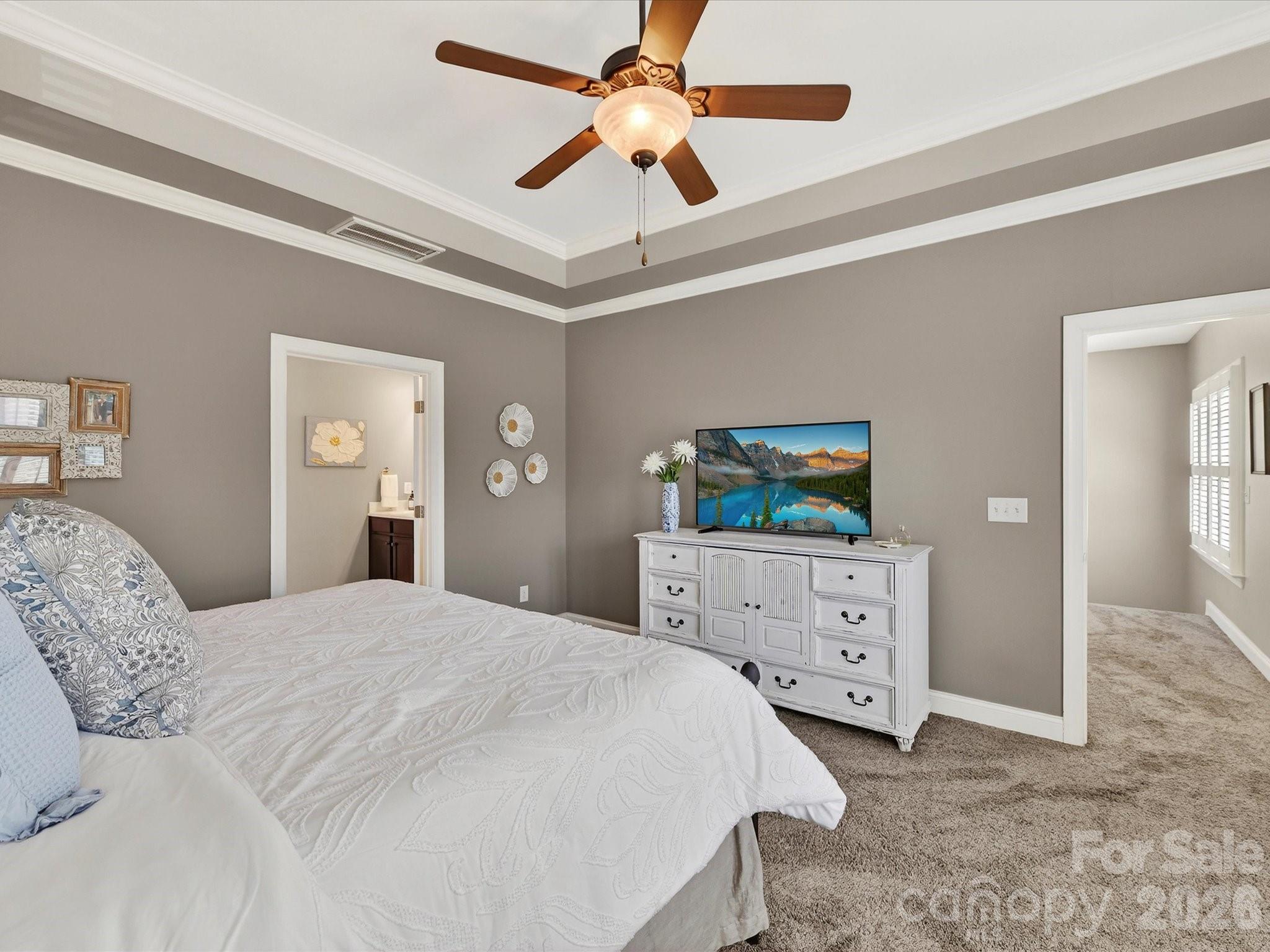 4265 Birkshire Heights Fort Mill, SC 29708 - Photo 27 of 47 a bedroom with a bed and a dresser