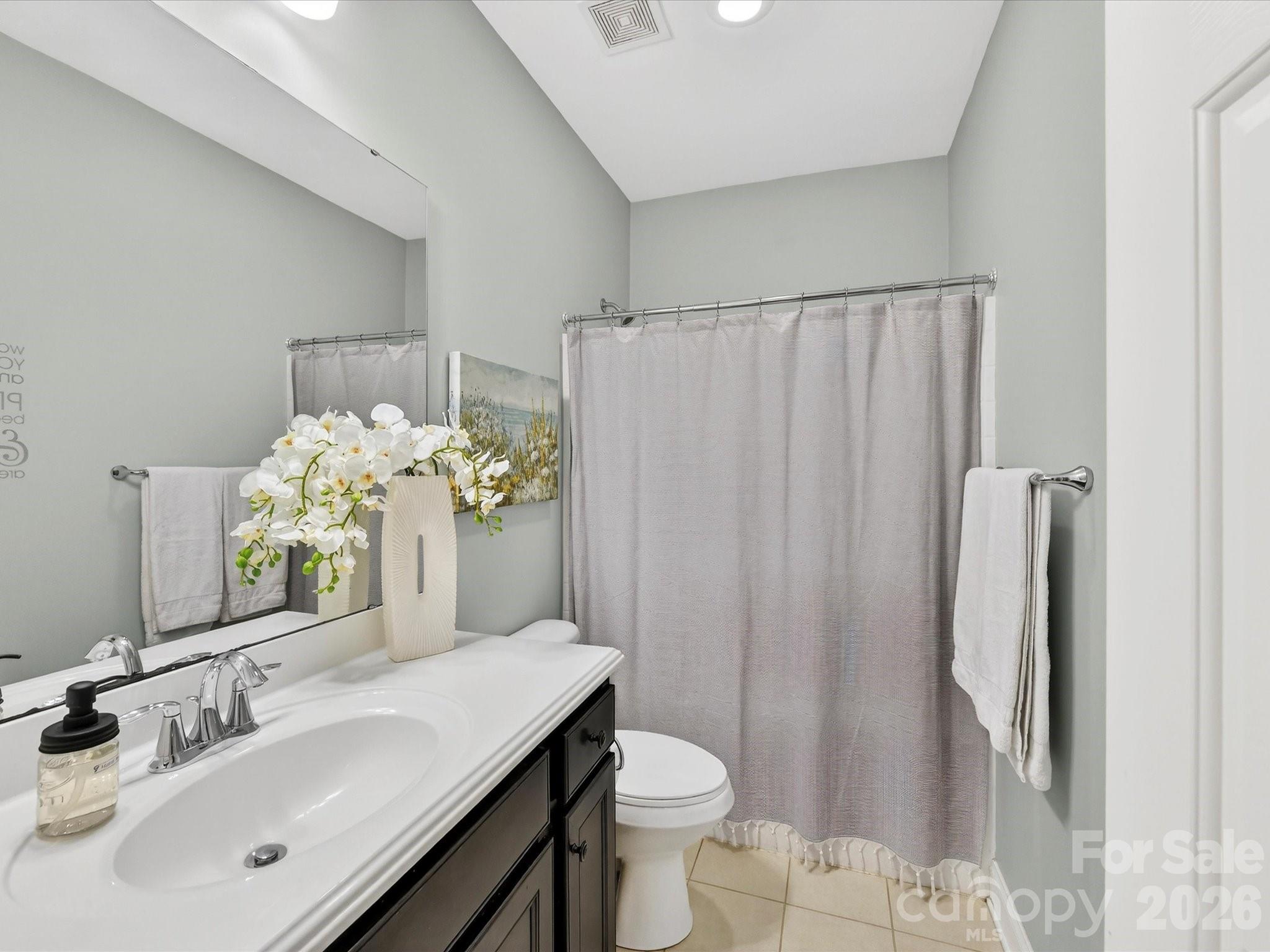 4265 Birkshire Heights Fort Mill, SC 29708 - Photo 33 of 47 a bathroom with a sink toilet and shower