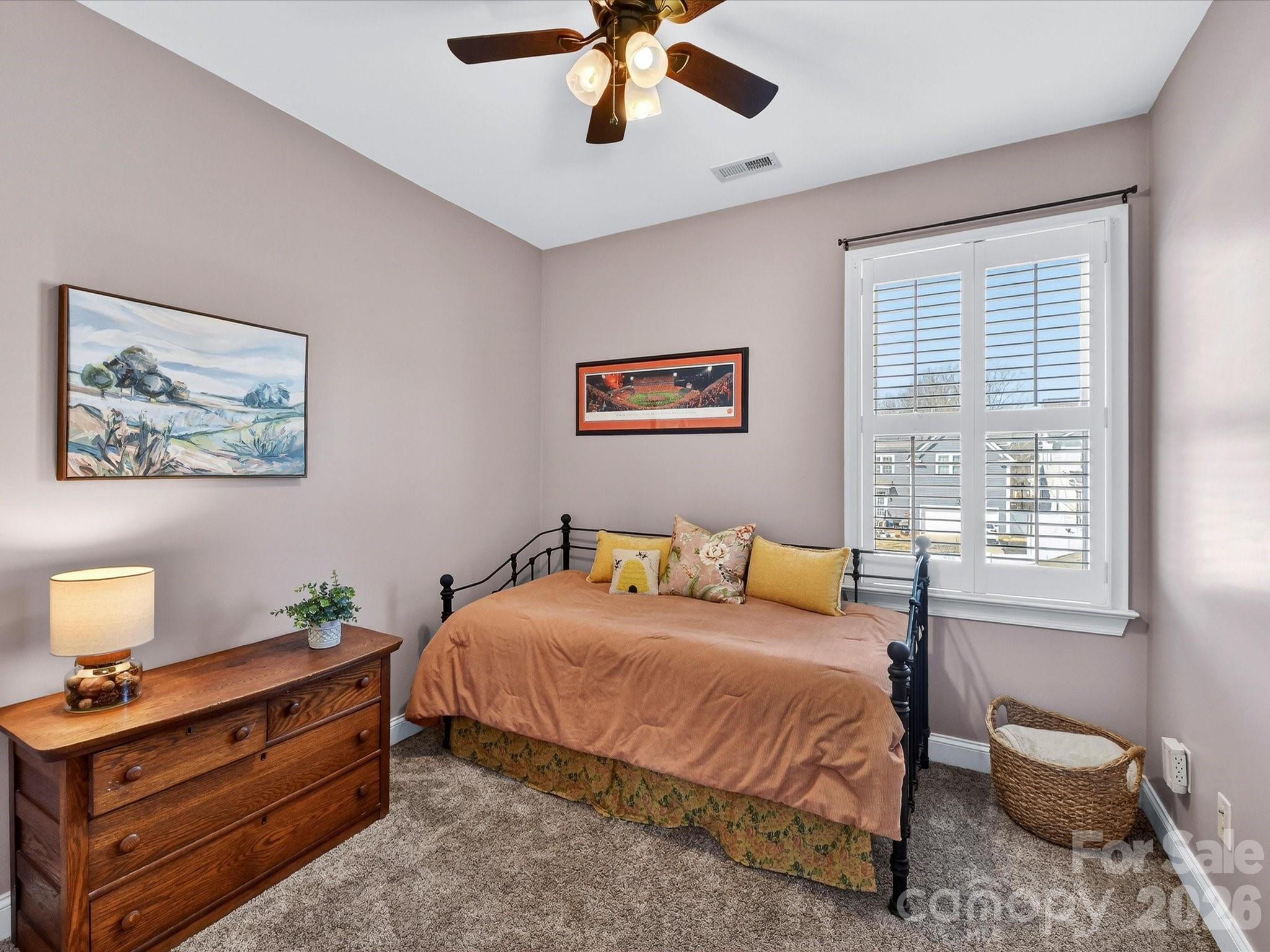 4265 Birkshire Heights Fort Mill, SC 29708 - Photo 34 of 47 a bedroom with a bed and a window