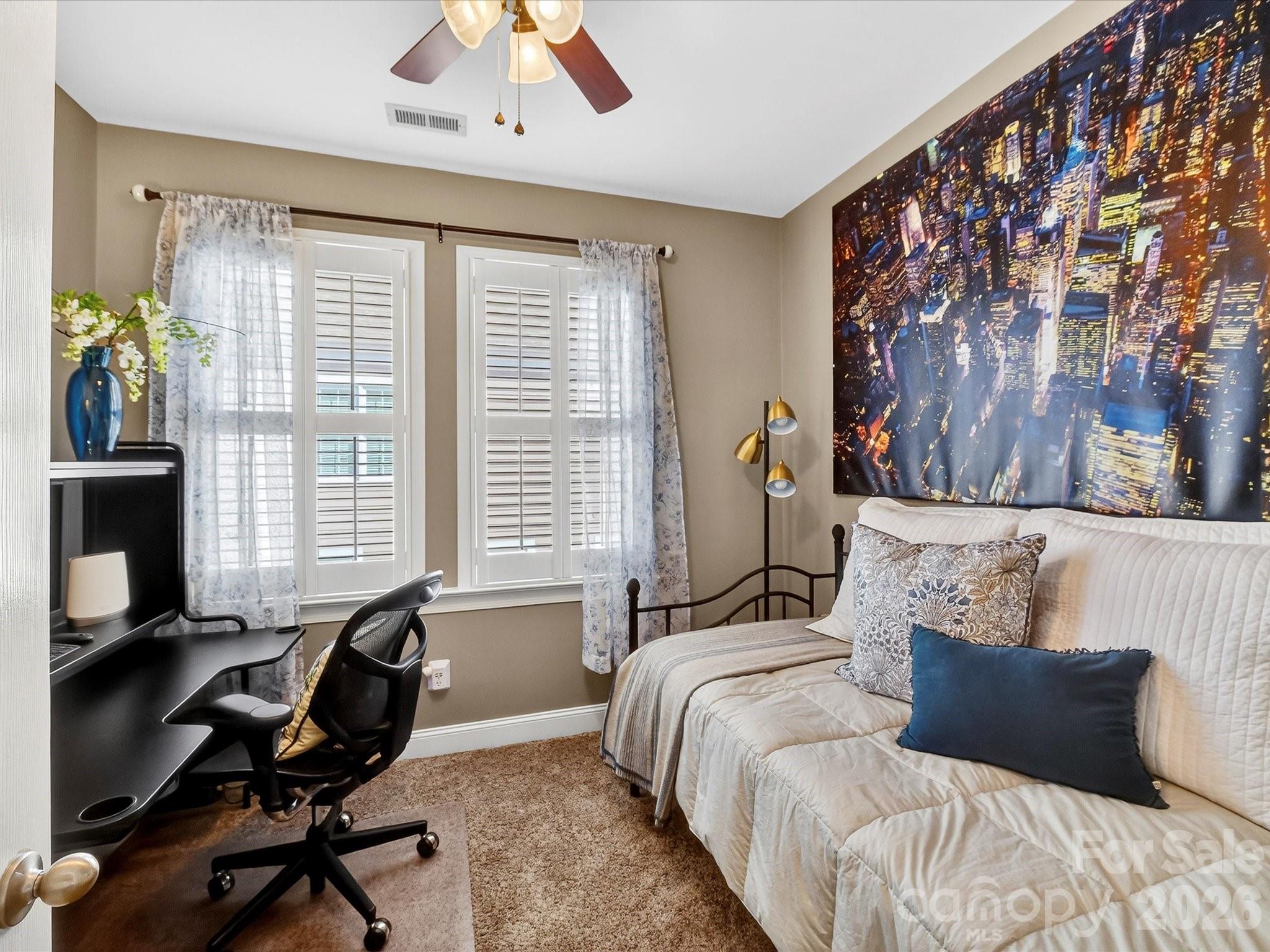 4265 Birkshire Heights Fort Mill, SC 29708 - Photo 36 of 47 a bedroom with a bed and a large window