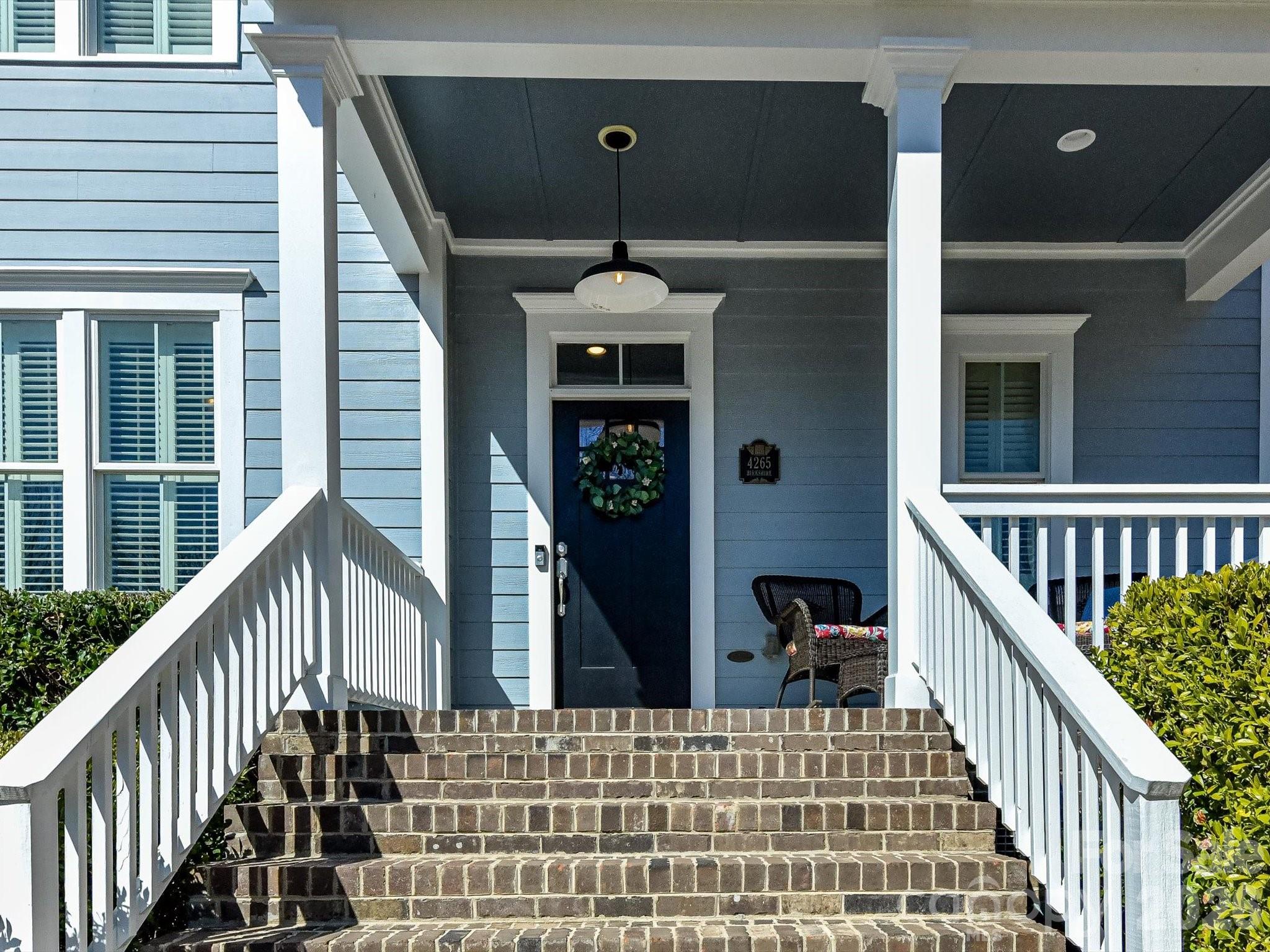 4265 Birkshire Heights Fort Mill, SC 29708 - Photo 4 of 47 a view of a balcony with a potted plant