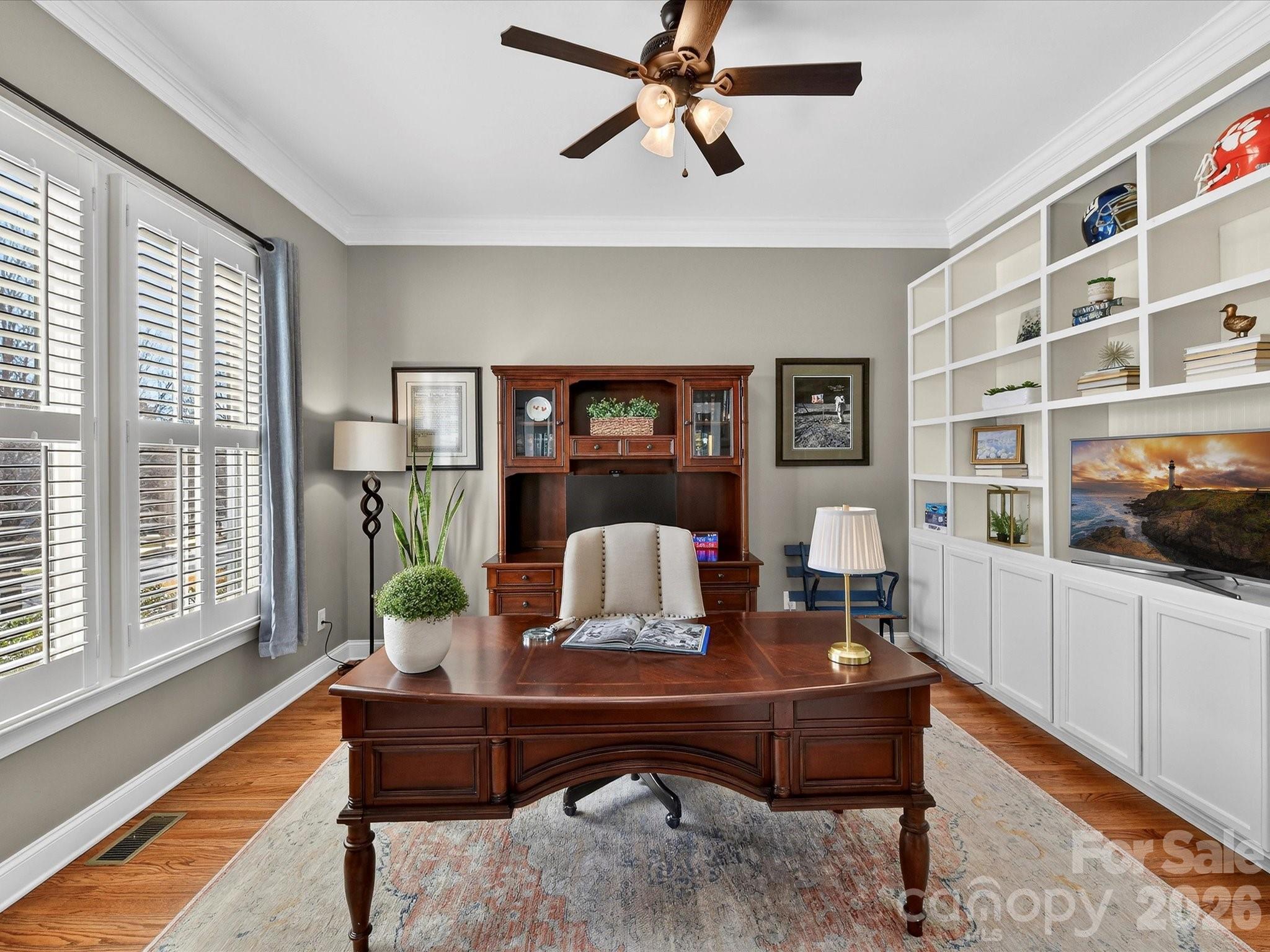 4265 Birkshire Heights Fort Mill, SC 29708 - Photo 8 of 47 a living room with furniture and a floor to ceiling window