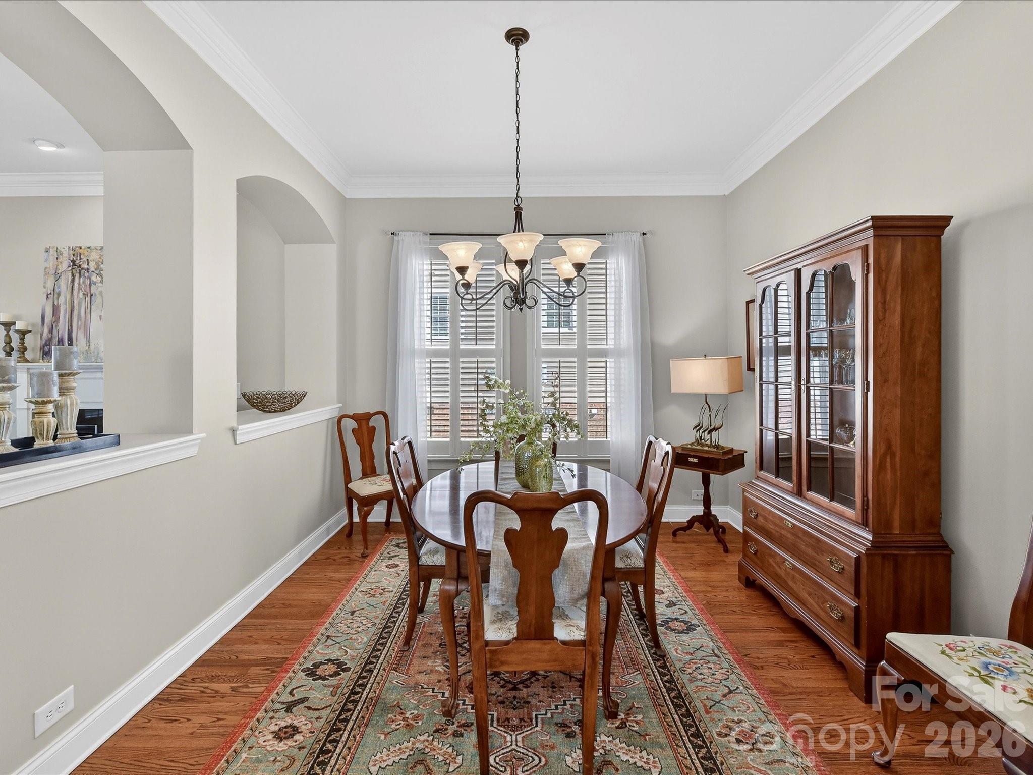 4265 Birkshire Heights Fort Mill, SC 29708 - Photo 10 of 47 a view of a dining room with furniture window and wooden floor