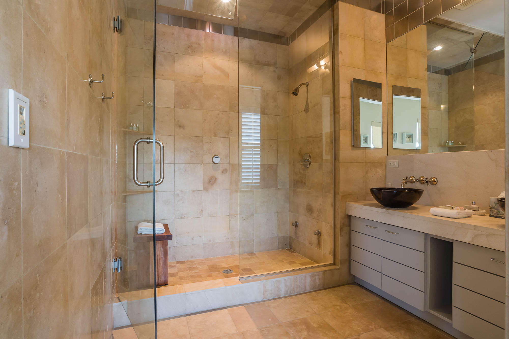 35 Central Square, Unit A2 Santa Rosa Beach, FL 32459 - Photo 21 of 34 a bathroom with a shower sink and mirror