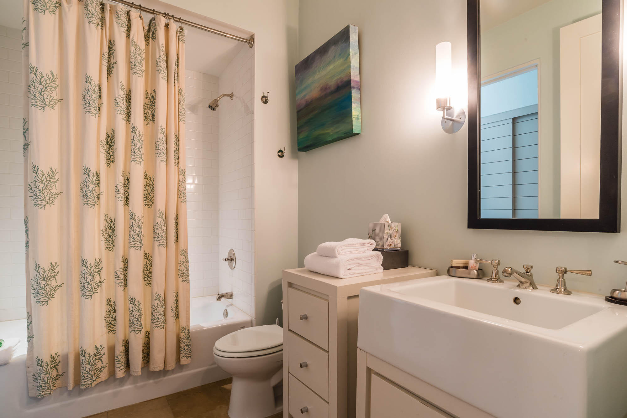 35 Central Square, Unit A2 Santa Rosa Beach, FL 32459 - Photo 29 of 34 a bathroom with a toilet sink and mirror