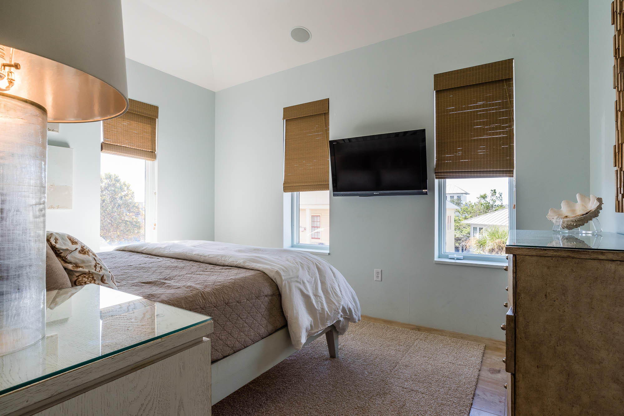 35 Central Square, Unit A2 Santa Rosa Beach, FL 32459 - Photo 31 of 34 a bedroom with a bed and a flat screen tv