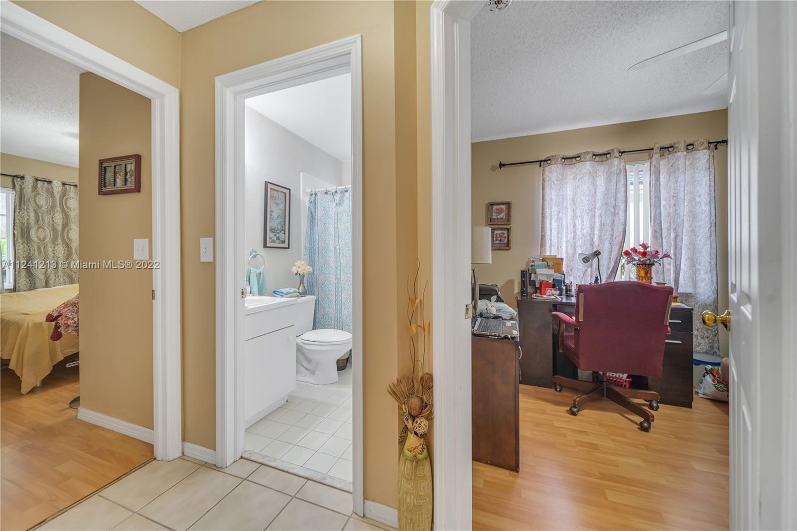 14202 Southwest 151st Court Miami, FL 33196 - Photo 12 of 23 a view of a room with dining area and glass door