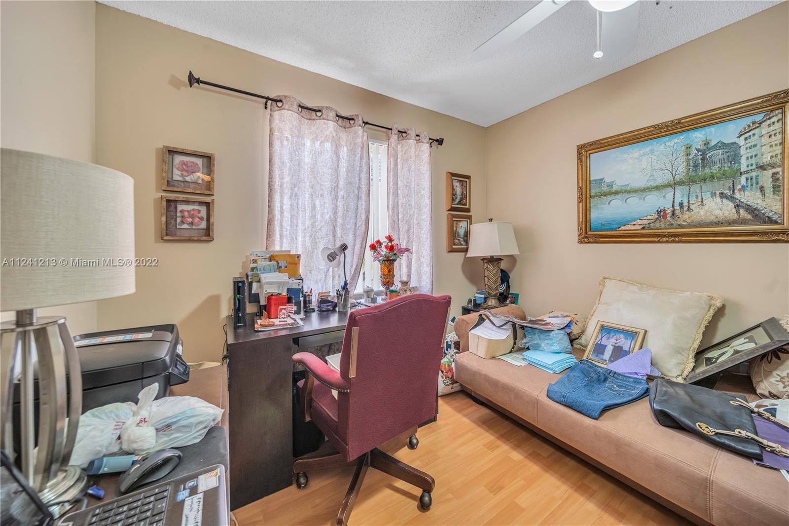 14202 Southwest 151st Court Miami, FL 33196 - Photo 15 of 23 a living room with furniture and a window