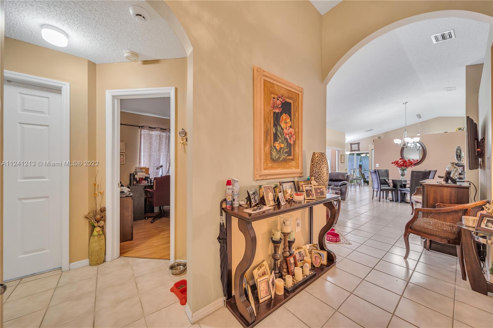 14202 Southwest 151st Court Miami, FL 33196 - Photo 5 of 23 a very nice looking living room with furniture