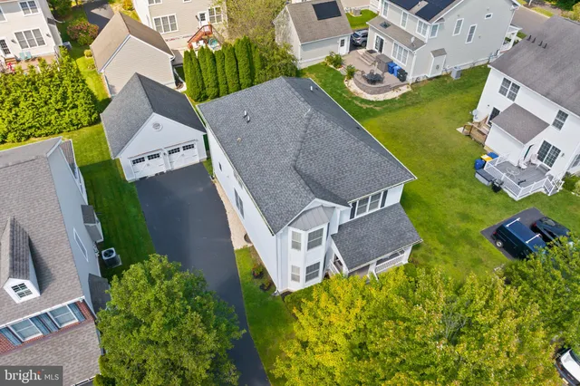 an aerial view of a house with a garden
