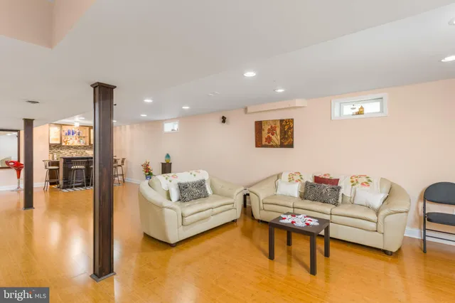a living room with furniture and a table