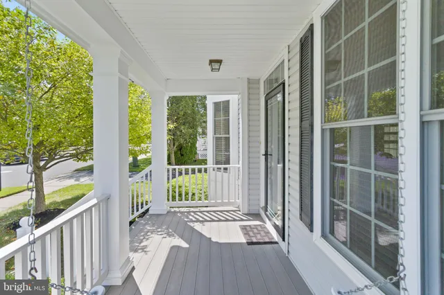 a view of balcony with wooden floor