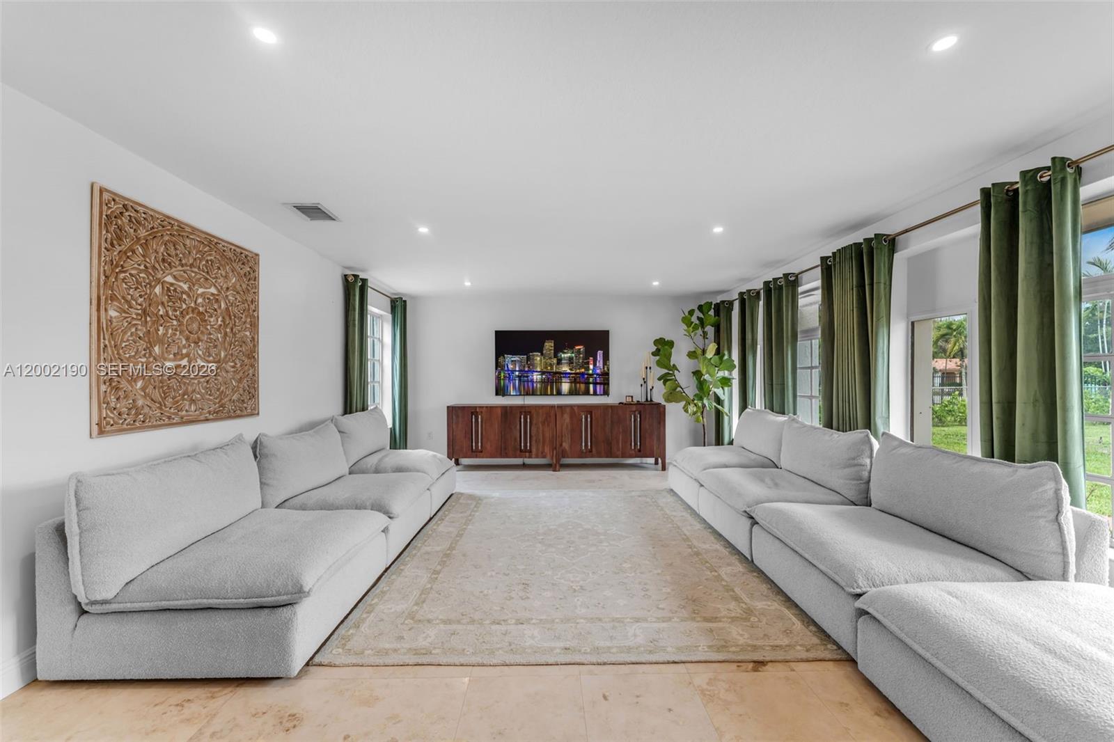 11350 Southwest 30th Street Miami, FL 33165 - Photo 11 of 25 a living room with furniture large window and couch
