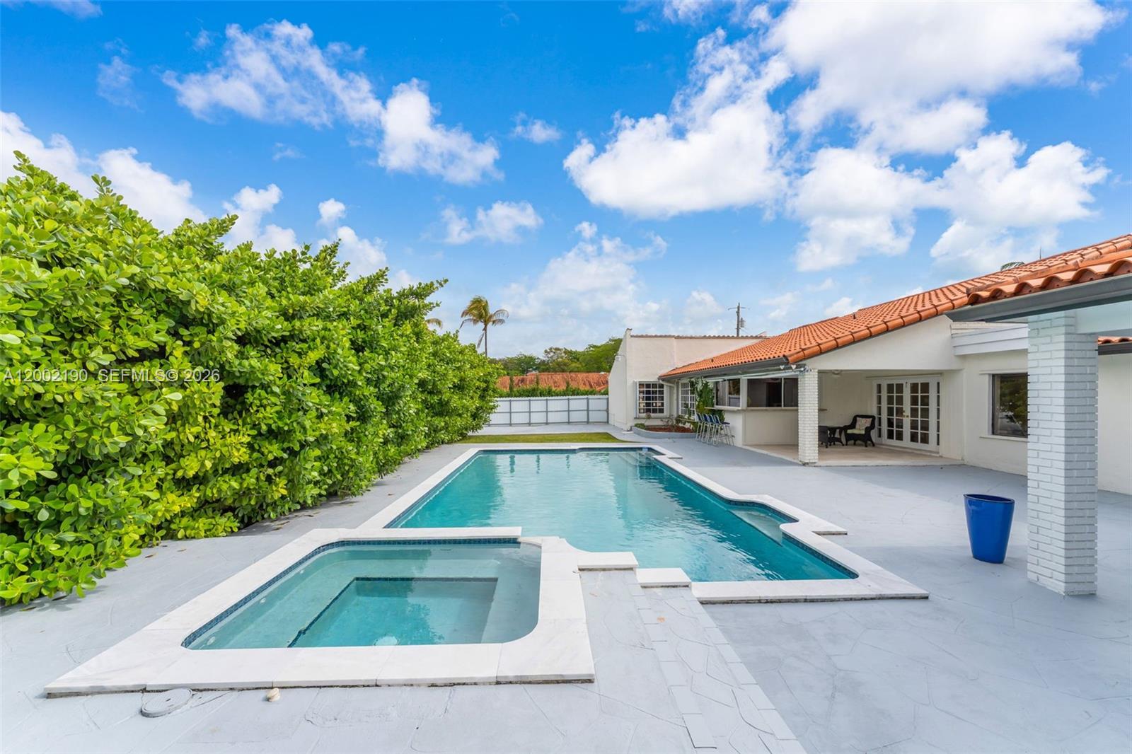 11350 Southwest 30th Street Miami, FL 33165 - Photo 2 of 25 a view of house with swimming pool
