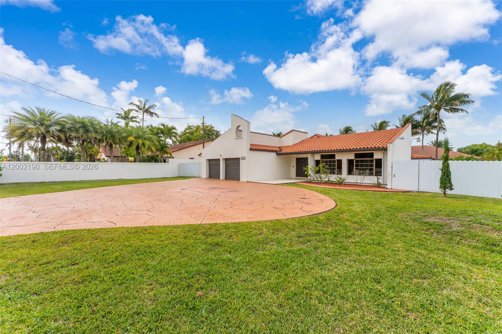 11350 Southwest 30th Street Miami, FL 33165 - Photo 23 of 25 a view of house with garden space and swimming pool
