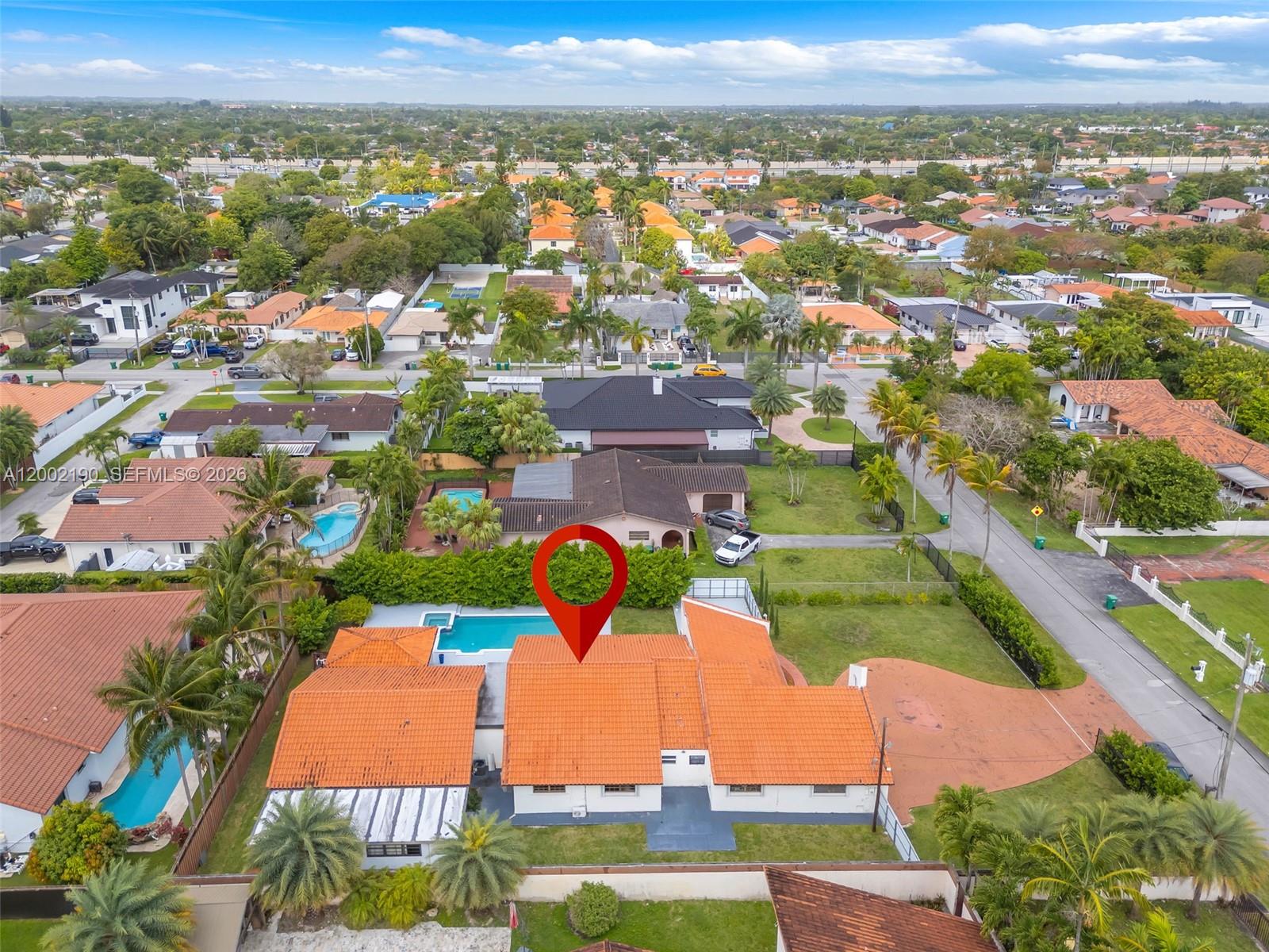 11350 Southwest 30th Street Miami, FL 33165 - Photo 7 of 25 an aerial view of residential houses with outdoor space and street view