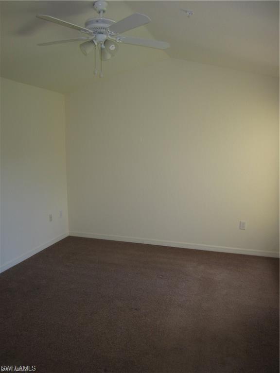 7960 Preserve Circle, Unit 634 Naples, FL 34119 - Photo 6 of 12 an empty room and a window