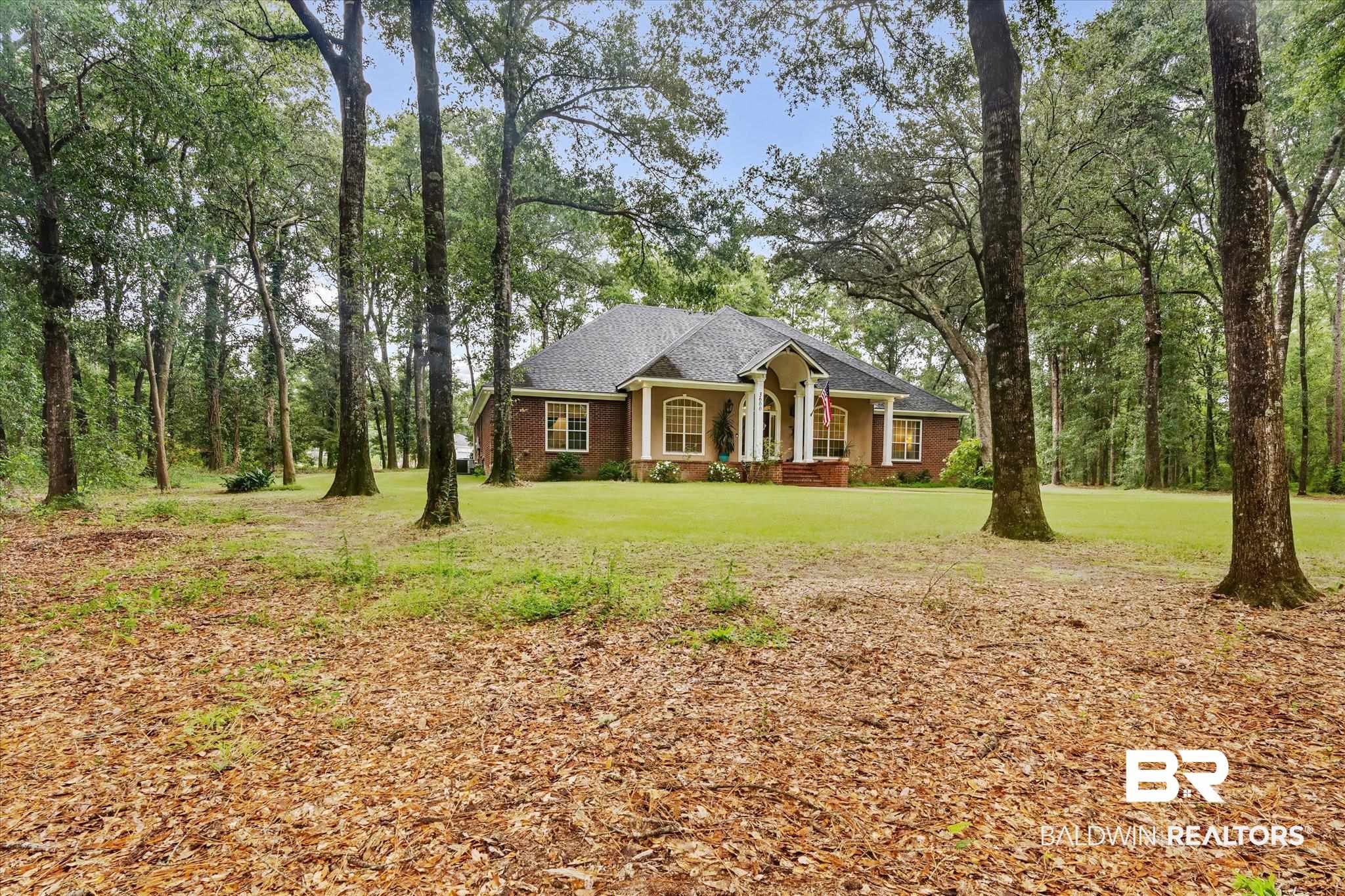 3600 Russells Lane Mobile, AL 36619 - Photo 29 of 43 View of front facade featuring a front lawn