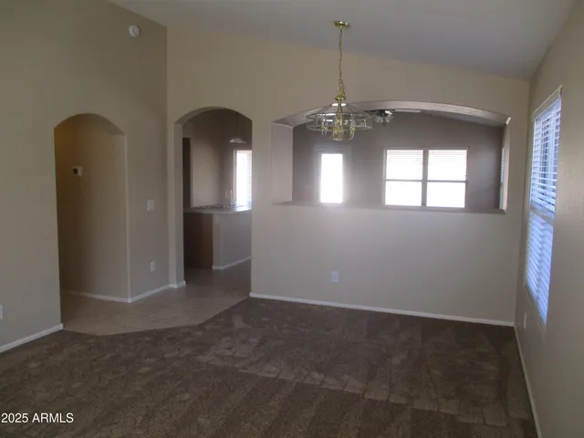 a view of a kitchen with a sink cabinets and a window