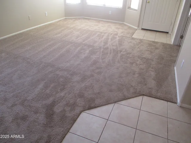 a kitchen with a sink a stove and a microwave oven in a cabinets