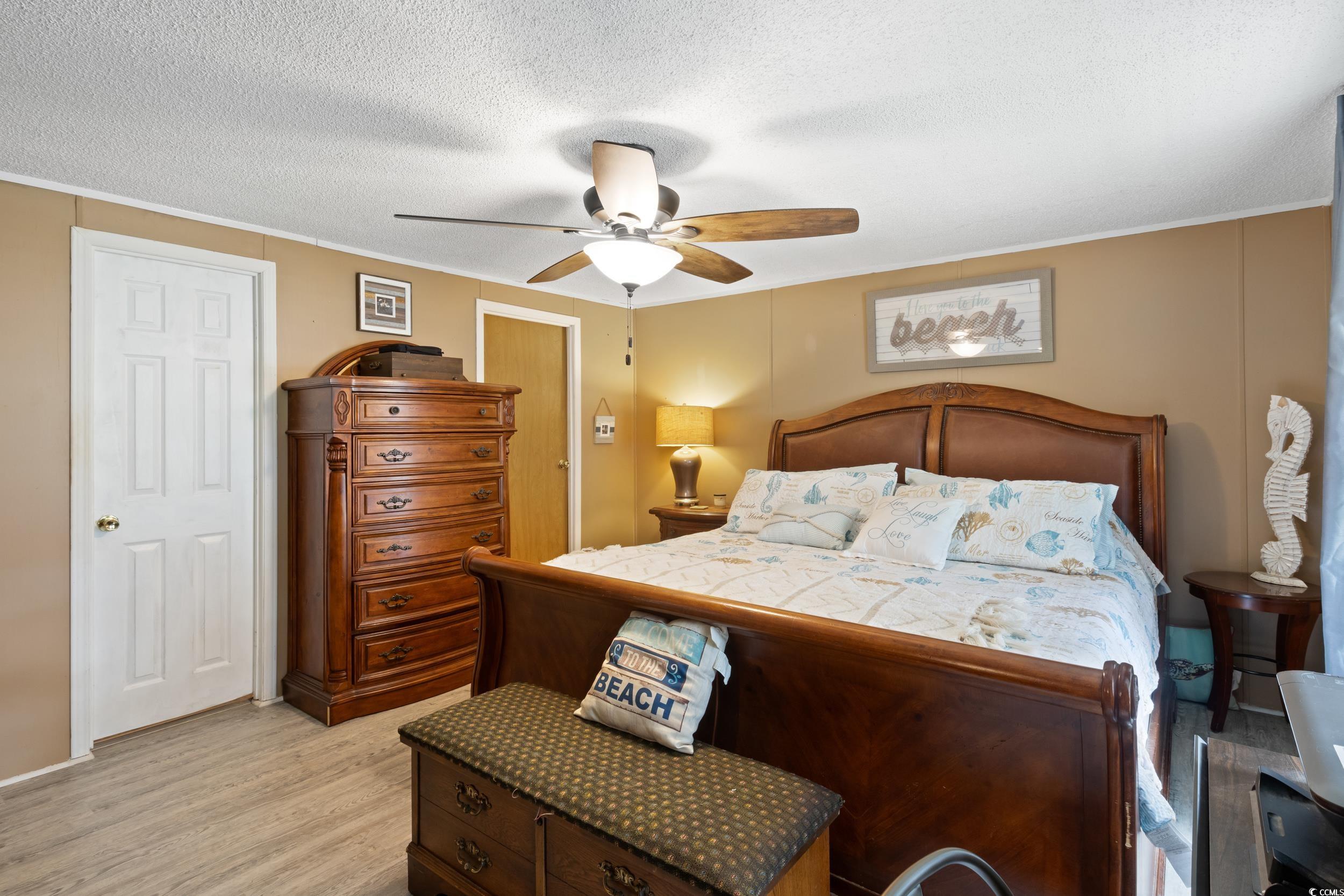 791 Finley Circle Murrells Inlet, SC 29576 - Photo 23 of 40 Bedroom featuring ceiling fan, a textured ceiling,