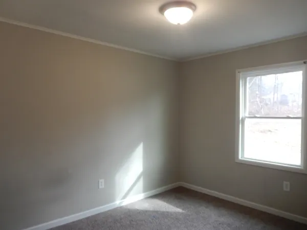 an empty room with a window