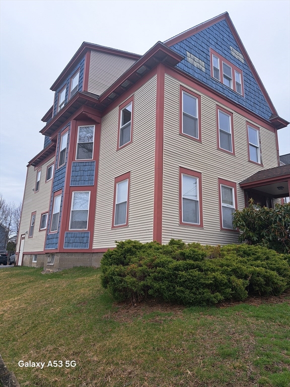 49 Francis Street, Unit 2 Worcester, MA 01606 - Photo 1 of 1 a front view of a house with garden