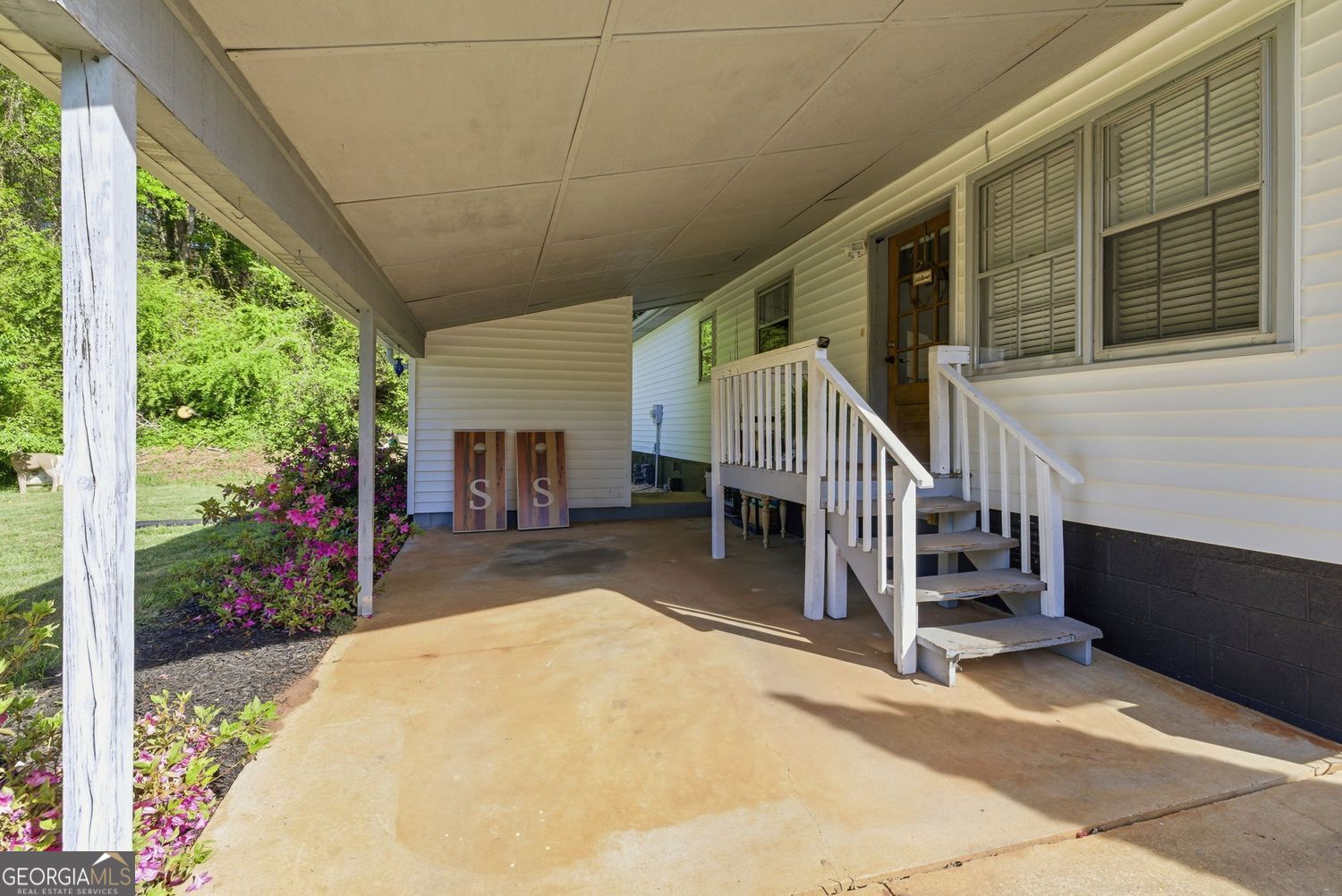 1193 Black Road Cleveland, GA 30528 - Photo 13 of 15 a view of a house with wooden floor and a porch