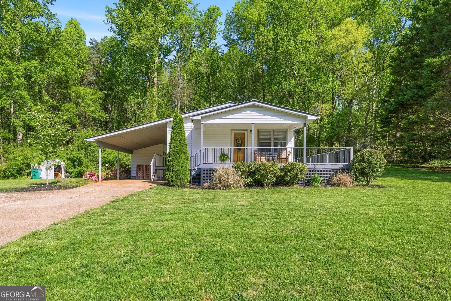 1193 Black Road Cleveland, GA 30528 - Photo 2 of 15 a front view of a house with a yard