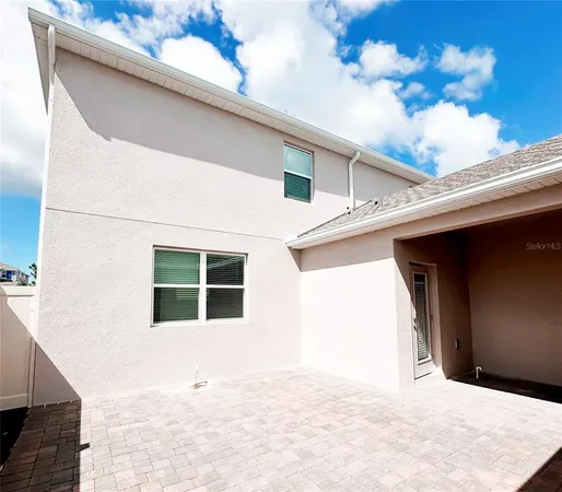 a house with trees in the background
