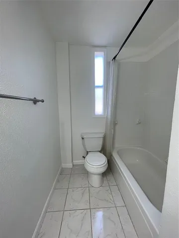 a bathroom with a sink a shower and a mirror